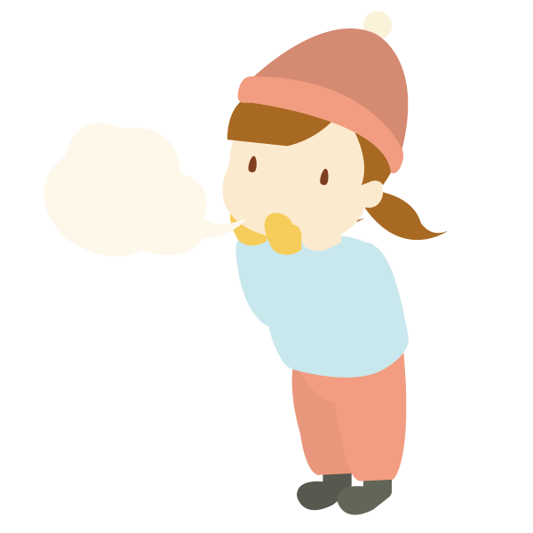 白い息を吐く女の子