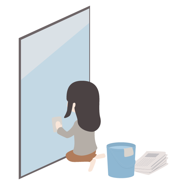 年末の大掃除をしている女性