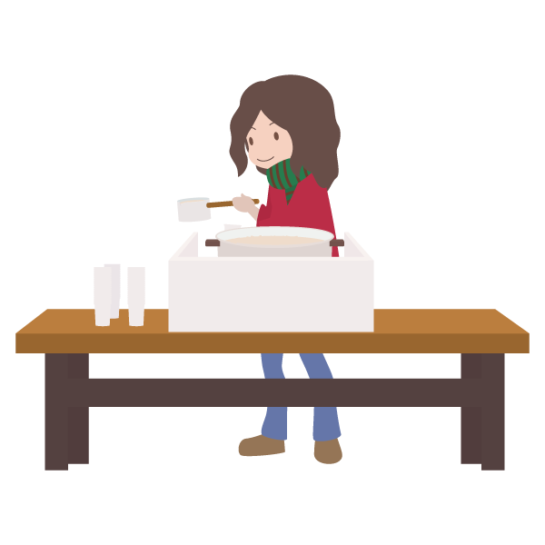 神社で甘酒を注ぐ女性