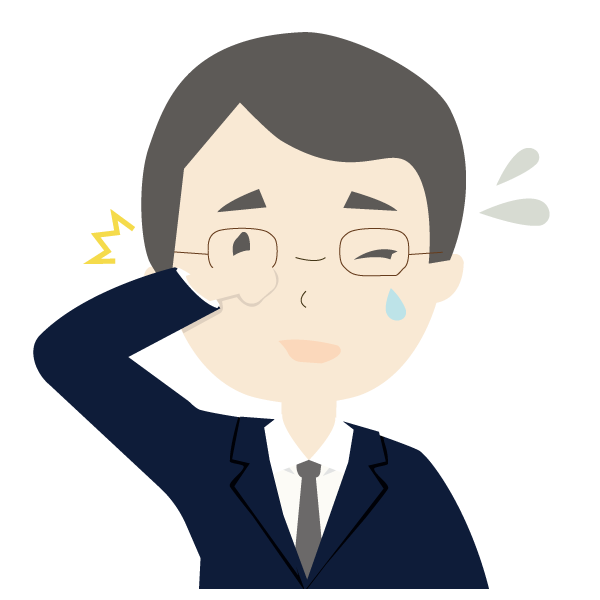 目にゴミが入った男性会社員