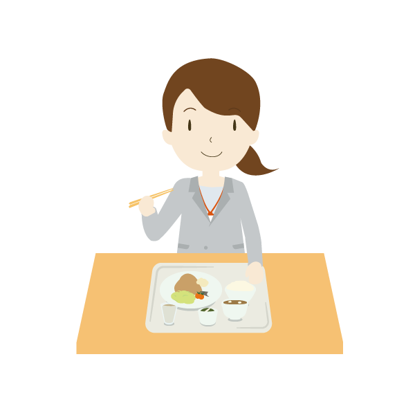 社食を食べる女性会社員