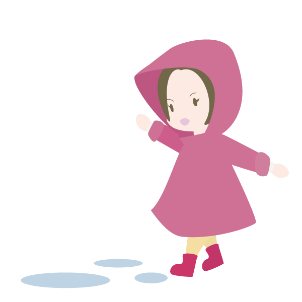 雨合羽を着て遊ぶ女の子