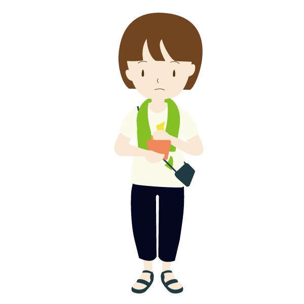 フェスでスマホを見る女性