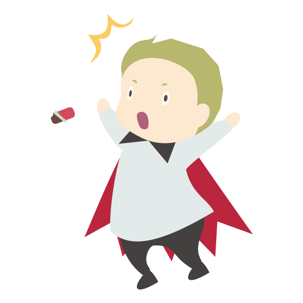 びっくりしているバンパイアの仮装をした少年