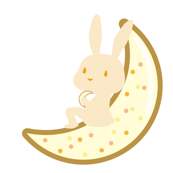 月のアイシングクッキーに座るうさぎ