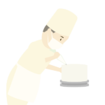 ケーキのデコレーションをするパティシエ