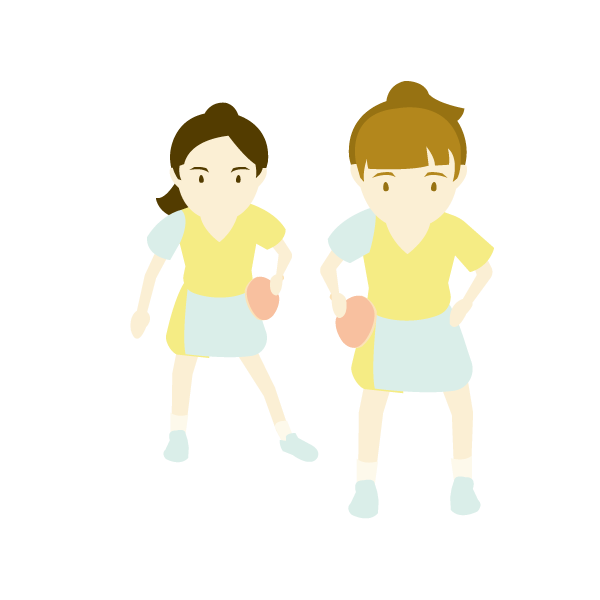 卓球でダブルスをする女性達