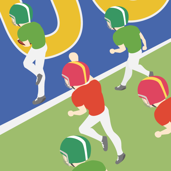 タッチダウンを決めたアメリカンフットボール選手