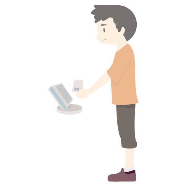 ICカードで出退勤の打刻をする私服勤務の男性