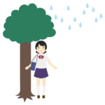 木の下で雨宿りをする女子学生