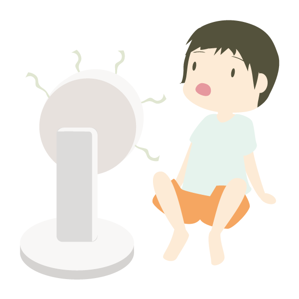 ボケーとしながら扇風機にあたっている少年