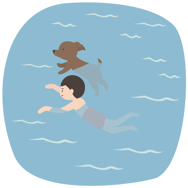 一緒に泳ぐ飼い主と犬