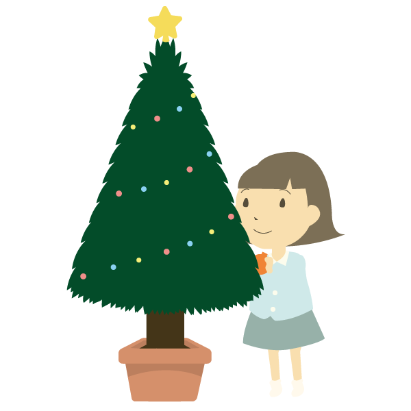 クリスマスツリーに飾り付けをする女の子