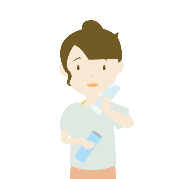 水筒型氷のうを使う女性