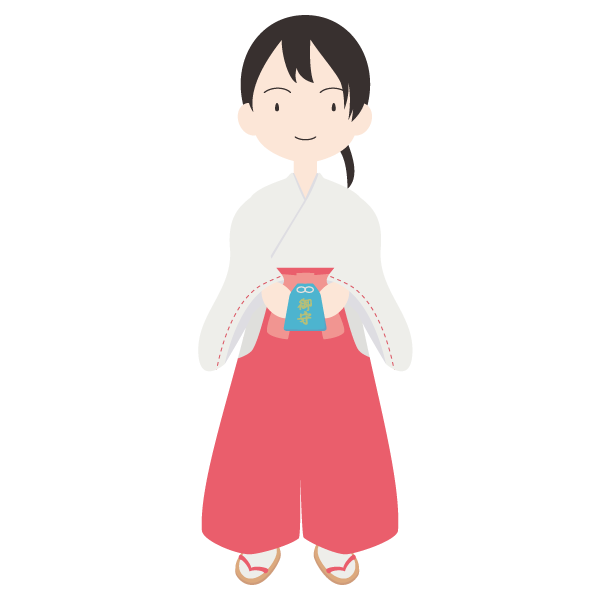 御守を渡す巫女