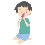 スイカを食べる少年