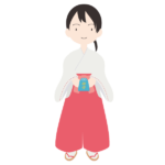 御守を渡す巫女